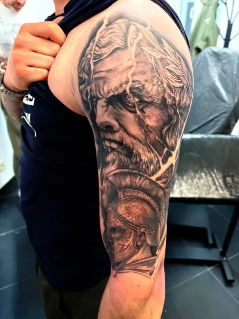 Tattoo by Robert Grzywacz, Tielt