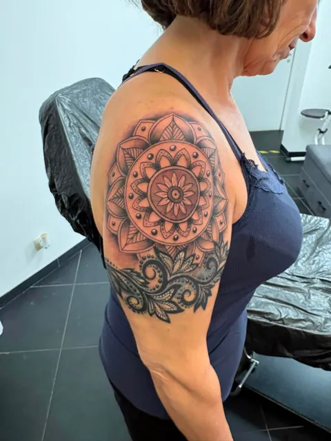 Tattoo by Robert Grzywacz, Tielt
